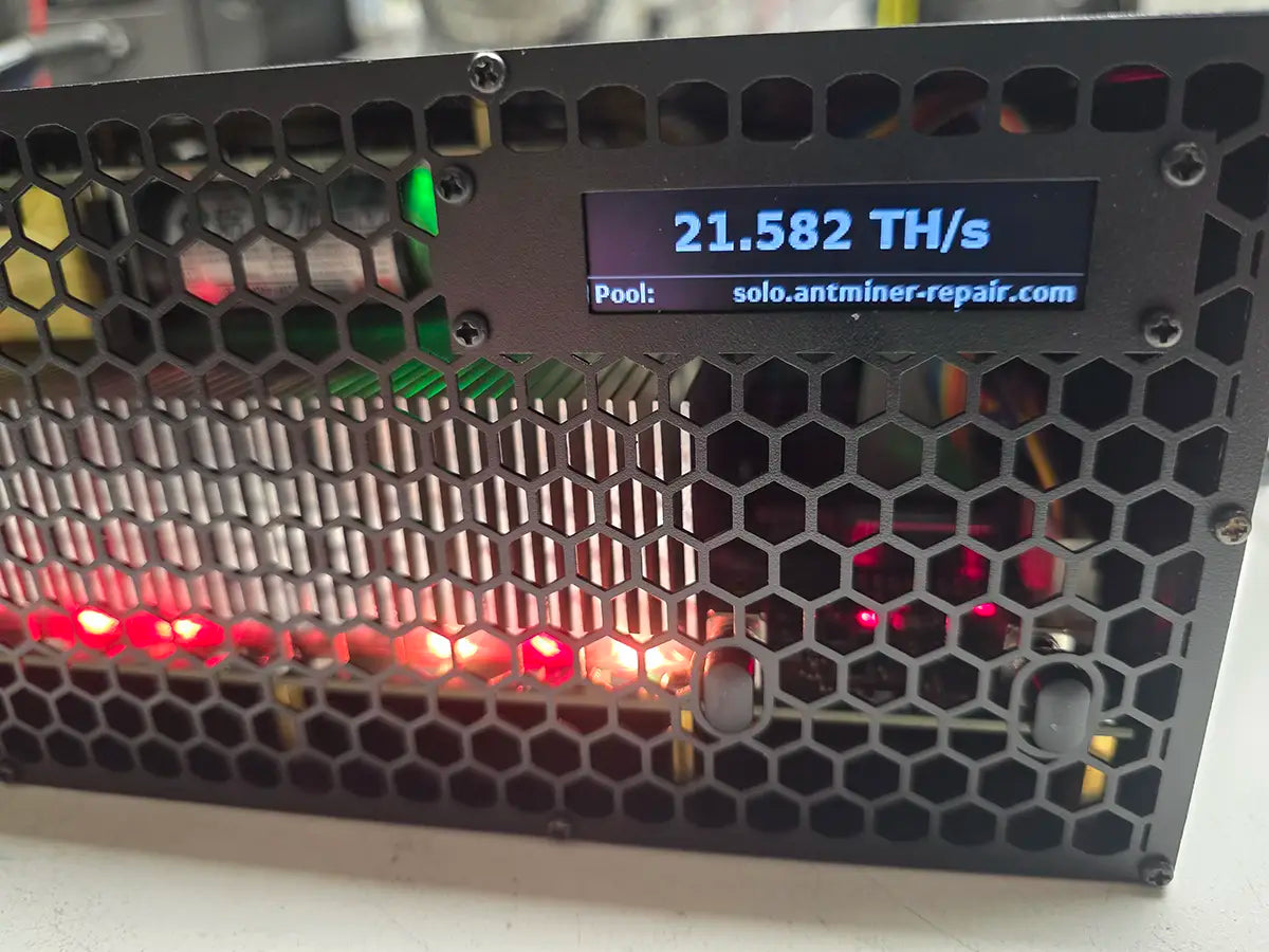 GekkoScience KBox front screen showing 21.582 TH/s while mining on our solo pool