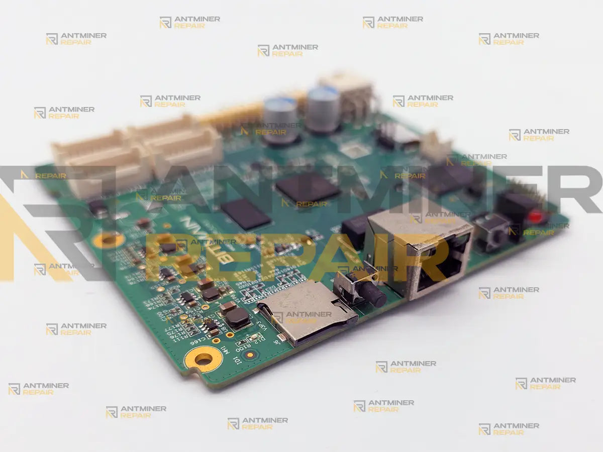 Antminer Xilinx control board seen from the port edge, with the microSD slot beside the Ethernet jack, the IP report button and the red and green status LEDs