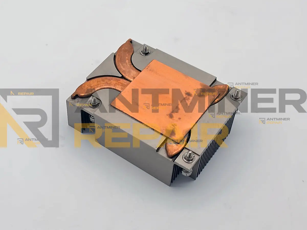 Bottom of a used Antminer Z15 ASIC heatsink: large copper contact plate and copper heat pipes